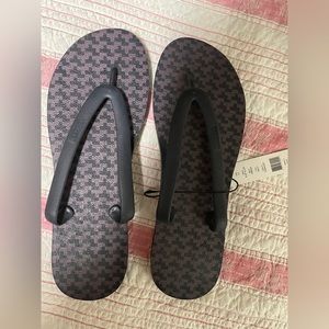 Theory size 10 flip flop, brand new with pattern HERRINGBONE